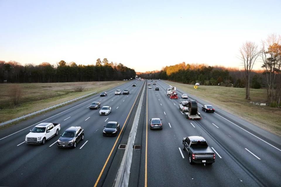 Traffic flows along I-77 Monday in Fort Mill on Monday. Road experts in York County say they need answers to combat rising road construction costs.