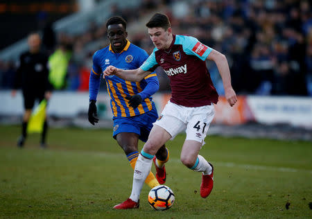 Soccer Football - FA Cup Third Round - Shrewsbury Town vs West Ham United - Montgomery Waters, Shrewsbury, Britain - January 7, 2018 West Ham United's Declan Rice in action with Shrewsbury Town’s Arthur Gnahoua REUTERS/Andrew Yates