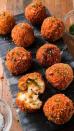 <p>This easy recipe turns those sad leftover mashed potatoes into something MAGICAL.</p><p>Get the <a href="https://www.delish.com/uk/cooking/recipes/a29245081/fried-mashed-potato-balls-recipe/" rel="nofollow noopener" target="_blank" data-ylk="slk:Fried Mashed Potato Balls;elm:context_link;itc:0;sec:content-canvas" class="link ">Fried Mashed Potato Balls</a> recipe.</p>