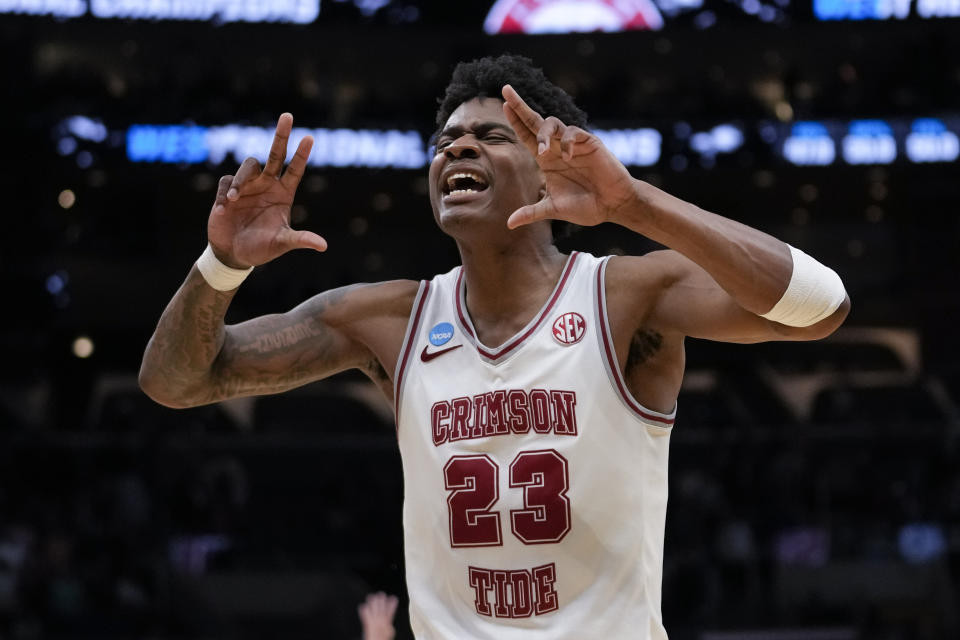 Alabama forward Nick Pringle (23) celebrates after a win over Clemson in an Elite 8 college basketball game in the NCAA tournament Saturday, March 30, 2024, in Los Angeles. (AP Photo/Ashley Landis)