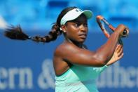 Aug 19, 2017; Mason, OH, USA; Sloane Stephens (USA) returns a shot against Simona Halep (ROU) during the Western and Southern Open at the Lindner Family Tennis Center. Mandatory Credit: Aaron Doster-USA TODAY Sports