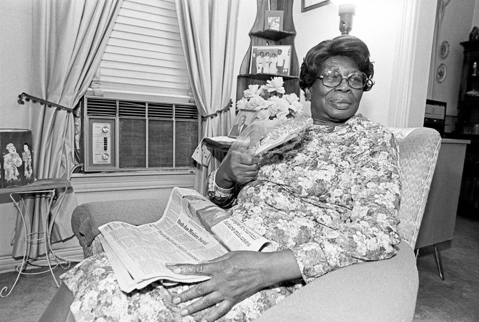 July 29, 1980: Bessie Woolen sits in her Colvin Street home in Fort Worth, fanning herself to get relief from the heat. Woolen was one of over 150 Tarrant County residents who applied for heat relief aid. Vince Heptig/Fort Worth Star-Telegram archive/UT Arlington Special Collections