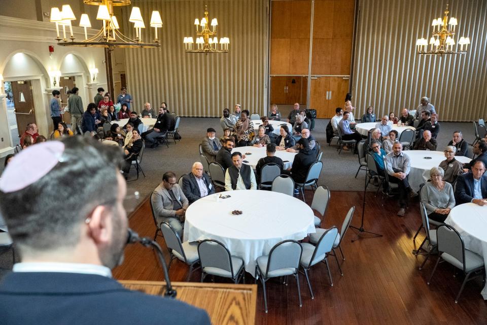 Rabbi Alex Braver speaks during an interfaith dinner in association with the Noor Islamic Center and the Congregation Tifereth Israel synagogue in Columbus on March 30.