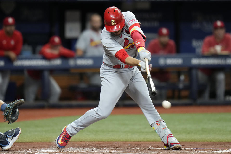 St. Louis Cardinals' Nolan Arenado lines an RBI single off Tampa Bay Rays relief pitcher Kevin Kelly during the third inning of a baseball game Wednesday, Aug. 9, 2023, in St. Petersburg, Fla. Cardinals' Lars Nootbaar scored on the hit. (AP Photo/Chris O'Meara)