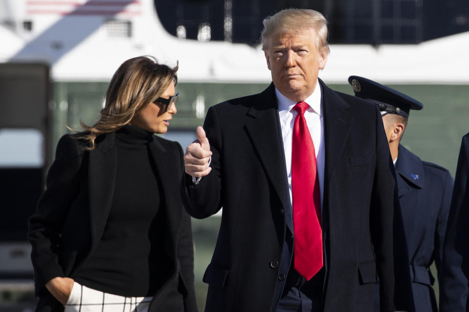 President Donald Trump, with first lady Melania Trump, gives a thumbs up as they walk to board Air Force One to depart for India, Sunday, Feb. 23, 2020, at Andrews Air Force Base, Md. (AP Photo/Alex Brandon)