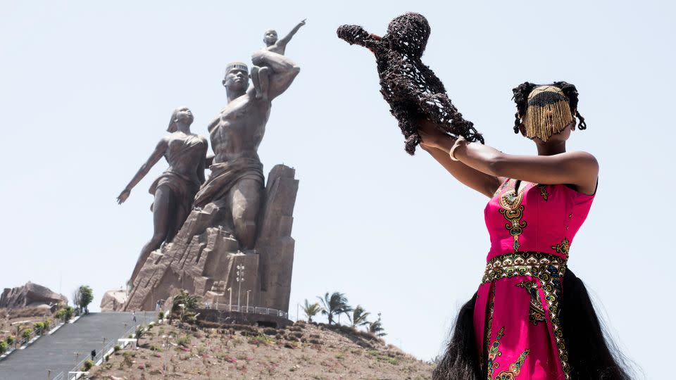 Sethembile Msezane has performed other performance pieces like this titled "So Long a Letter," at the African Renaissance Monument in Senegal in 2016. - Sethembile Msezane