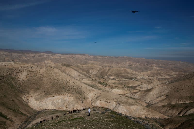 A Jewish shepherd is seen in the landscape near the Israeli settlement of Mitzpe Yericho in the Jordan Valley in the Israeli-occupied West Bank