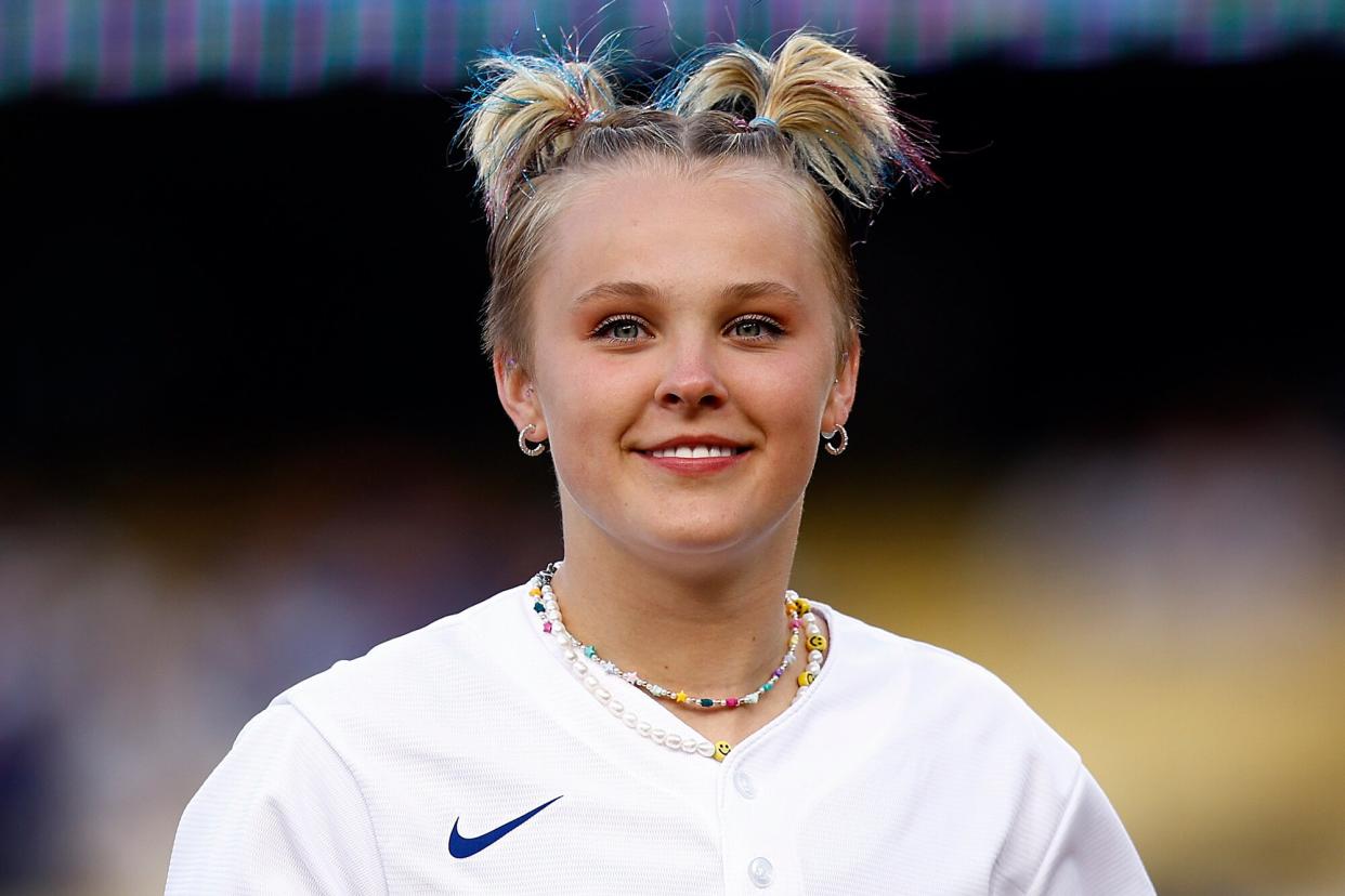 Jojo Siwa before a game between the New York Mets and the Los Angeles Dodgers on LGBTQ+ Pride Night at Dodger Stadium on June 03, 2022 in Los Angeles, California.