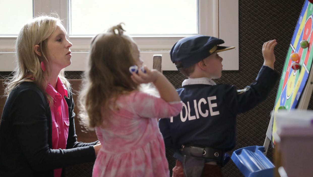 Teacher Val Pitchford plays with Sage Myers and  Solomon O'Connor, right, at the Lily Pad Learning Center on Wednesday, September 20, 2023, in Fond du Lac.