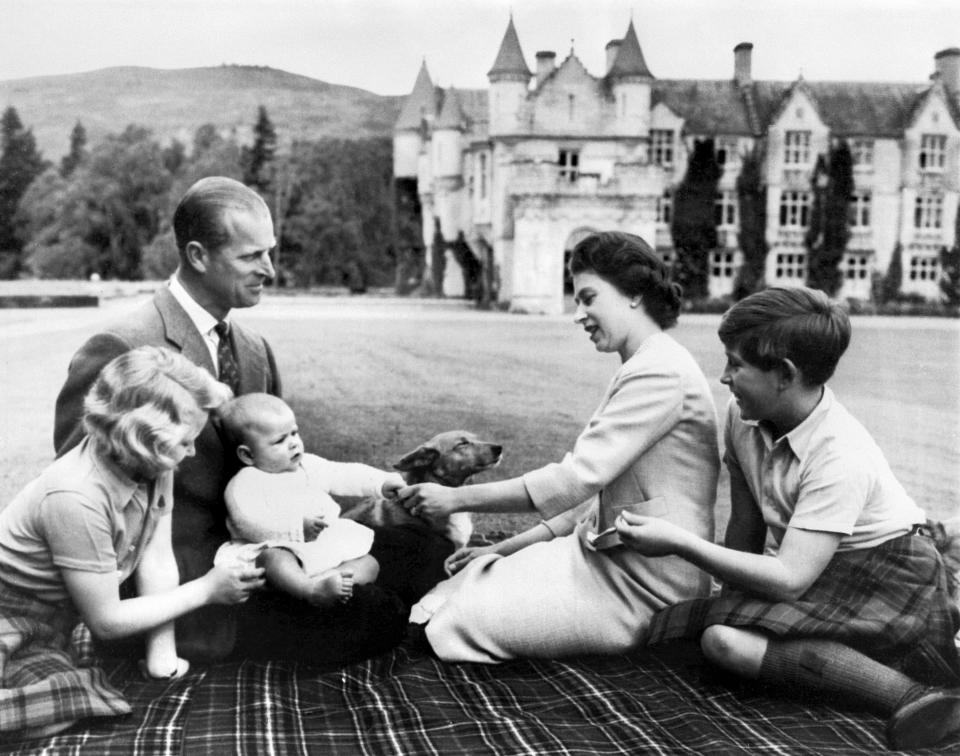 The Queen loved Balmoral, where she spent a lot of time with her family throughout her life. The Queen is pictured here with her late husband, Prince Philip, and their three children Prince Charles, Princess Anne and Prince Andrew on September 9, 1960. (Getty Images) 