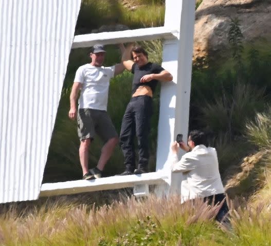 <p>NATO / BACKGRID</p> Tom Cruise and film crew at the Hollywood sign in Los Angeles on March 16, 2024