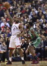 Toronto Raptors forward Kawhi Leonard (2) controls the ball as Boston Celtics forward Jaylen Brown (7) applies pressure during first-half NBA basketball game action in Toronto, Friday, Oct. 19, 2018. (Frank Gunn/The Canadian Press via AP)