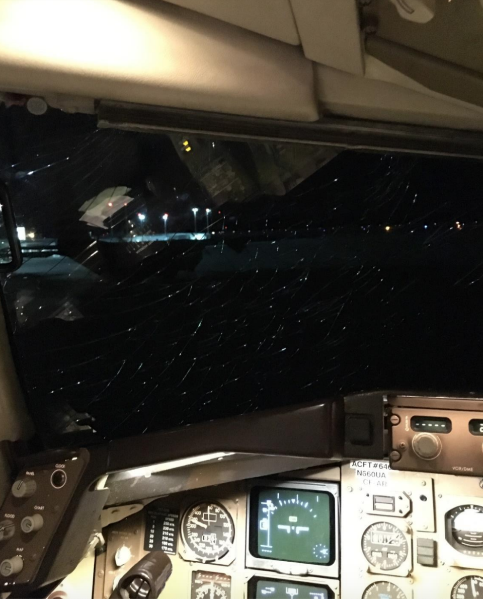 A photo included in the lawsuit depicts the busted windshield of the aircraft. (Photo: Attorneys for Plaintiff Theodore Liaw)