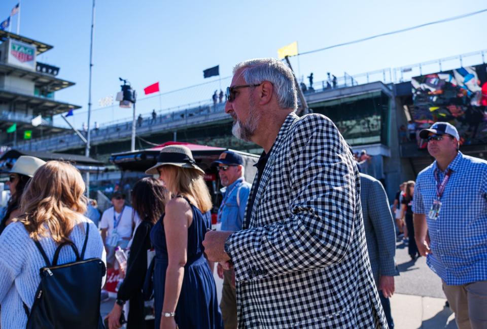 Indiana Governor Eric Holcomb makes his way along pit road Sunday, May 29, 2022, prior to the start of the 106th running of the Indianapolis 500 at Indianapolis Motor Speedway.