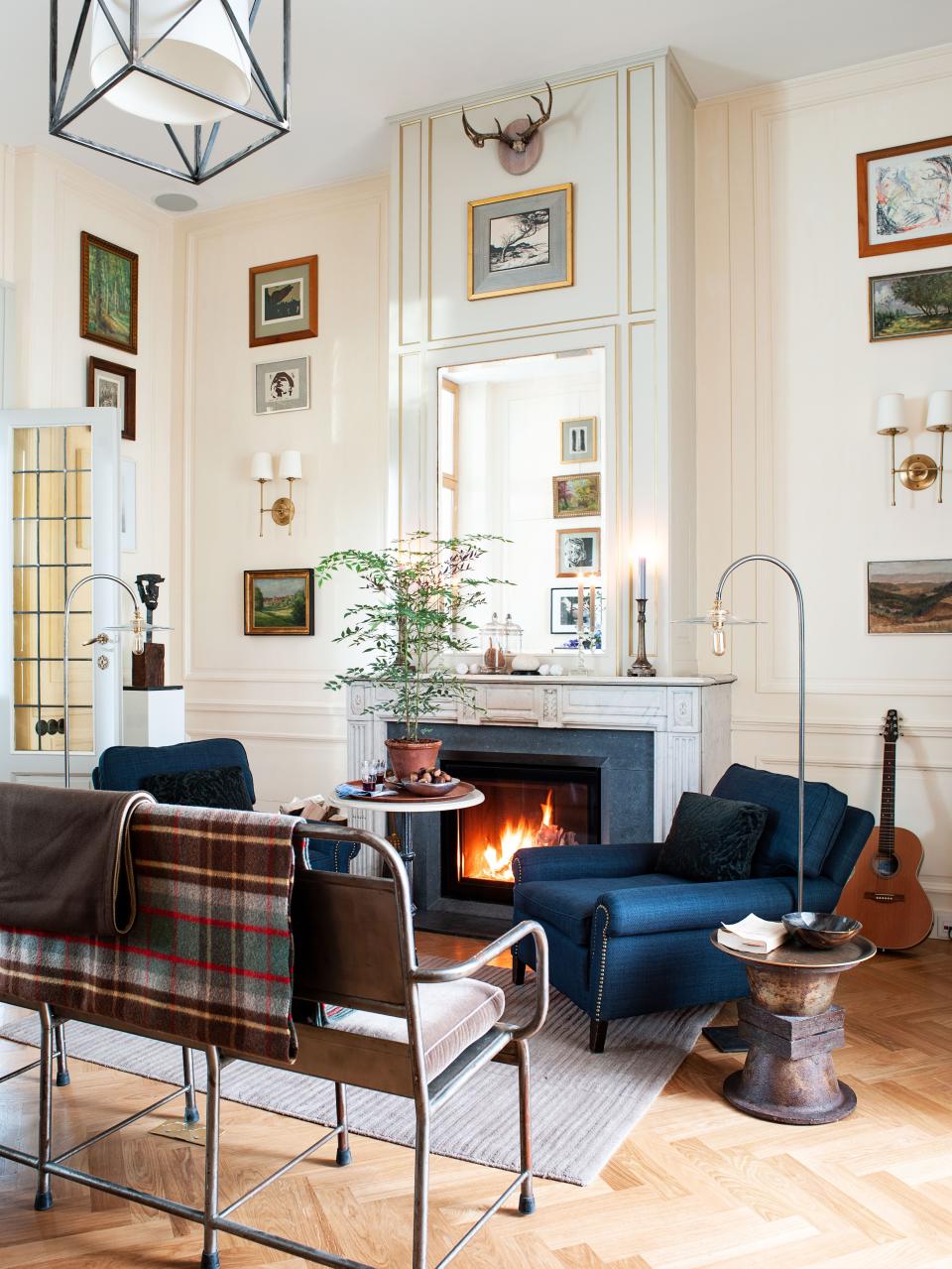 Eclectic finds collected over many years fill the restored Brussels home of Melañio Gomez and Chris Kangas.