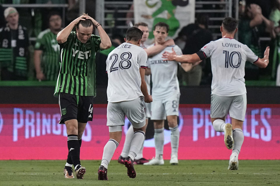 Austin FC defender Kipp Keller (4) reacts as St Louis City SC players celebrate a goal during the second half of an MLS soccer match in Austin, Texas, Saturday, Feb. 25, 2023. (AP Photo/Eric Gay)