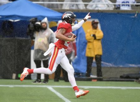 Jan 27, 2019; Orlando, FL, USA; AFC cornerback Chris Harris Jr. of the Denver Broncos (25) celebrates after making an interception catch against NFC in the NFL Pro Bowl football game at Camping World Stadium. Mandatory Credit: Steve Mitchell-USA TODAY Sports