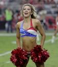 <p>The Arizona Cardinals cheerleaders perform during the first half of an NFL football game against the San Francisco 49ers, Sunday, Nov. 13, 2016, in Glendale, Ariz. (AP Photo/Rick Scuteri) </p>