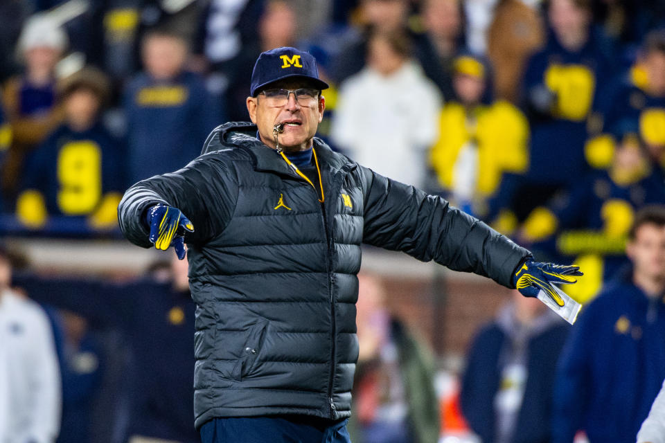 Jim Harbaugh's Wolverines are still undefeated despite all the turmoil surrounding their season. (Photo by Aaron J. Thornton/Getty Images)