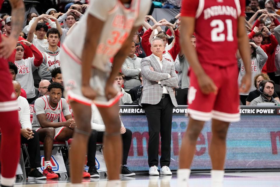 Feb 6, 2024; Columbus, Ohio, USA; Ohio State Buckeyes head coach Chris Holtmann watches during the second half of the men’s basketball game against the Indiana Hoosiers at Value City Arena. Ohio State lost 76-73.