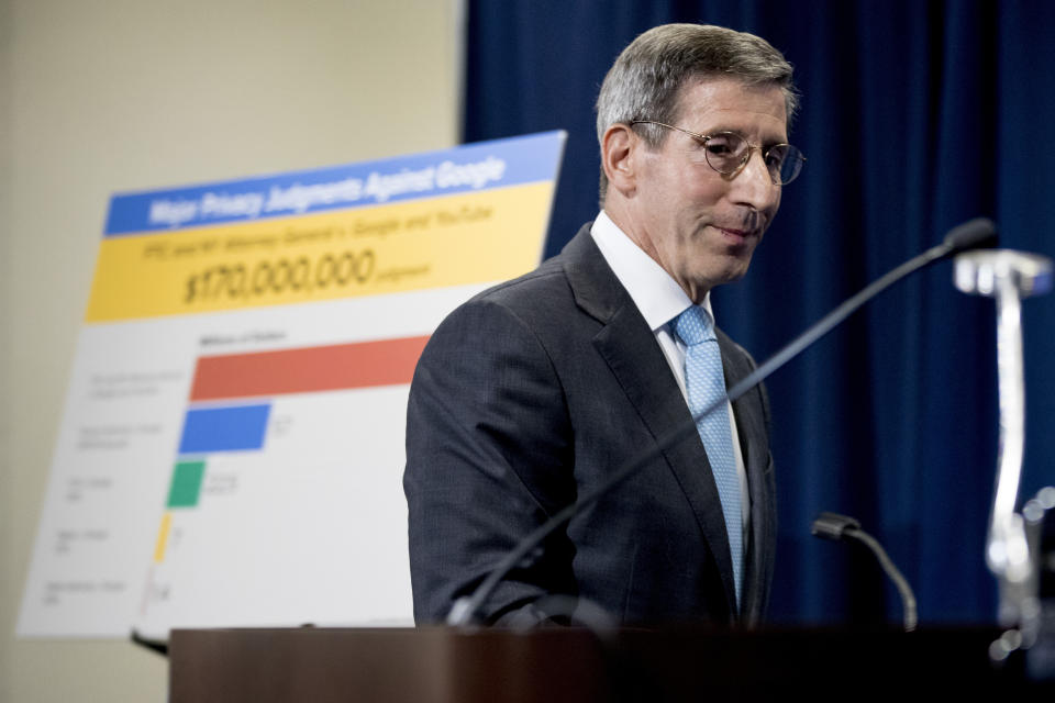 Federal Trade Commission Chairman Joe Simons arrives for a news conference at the Federal Trade Commission in Washington, Wednesday, Sept. 4, 2019, to announce that Google's video site YouTube has been fined $170 million to settle allegations it collected children's personal data without their parents' consent. (AP Photo/Andrew Harnik)