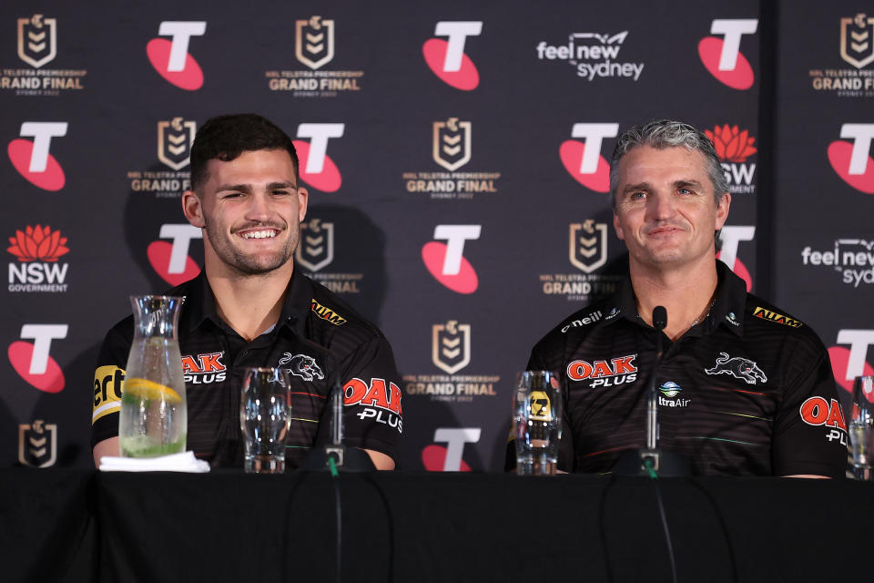 Nathan Cleary, pictured here speaking to the media alongside Panthers coach and father Ivan.