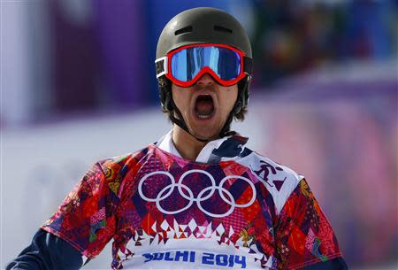 Russia's Vic Wild reacts during the men's parallel slalom snowboard finals at the 2014 Sochi Winter Olympic Games in Rosa Khutor February 22, 2014. REUTERS/Lucas Jackson