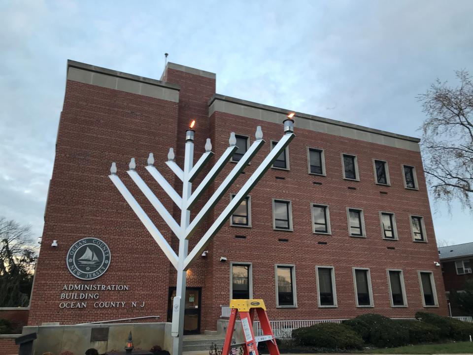 Ocean County government’s first Hanukkah menorah on the south lawn of its Administration Building at Hooper Avenue and Washington Street in downtown Toms River.