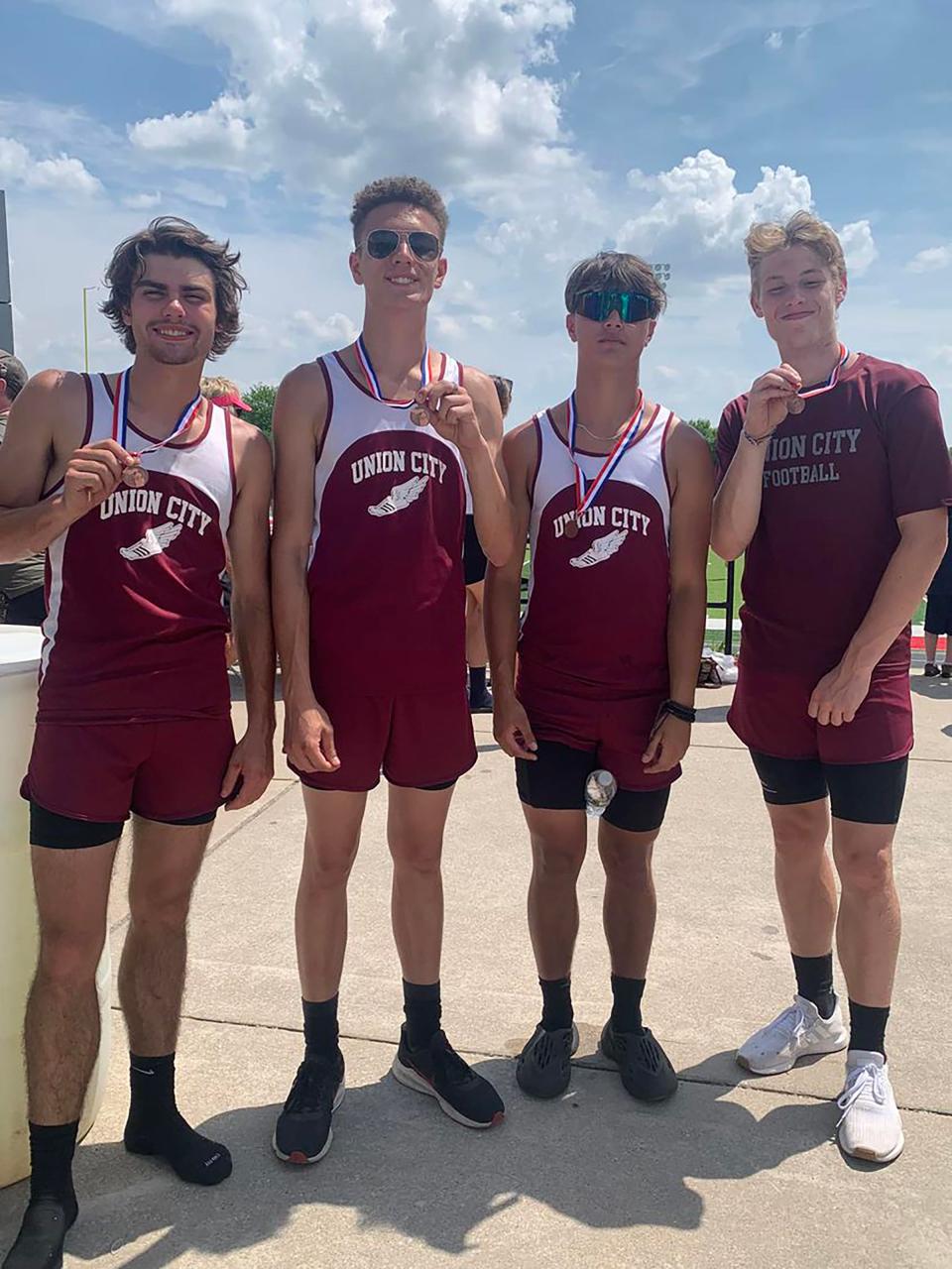 The Union City 800 meter relay team of (from left) Alex Hull, Hunter Sinke, Riley Laird and Caden Hughes earned All State honors Saturday, taking fifth place.