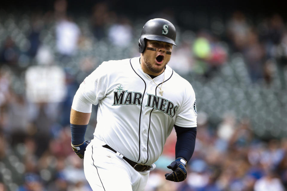 Jun 19, 2019; Seattle, WA, USA; Seattle Mariners first baseman Daniel Vogelbach (20) reacts after hitting a solo-home run against the Kansas City Royals during the first inning at T-Mobile Park. Mandatory Credit: Joe Nicholson-USA TODAY Sports