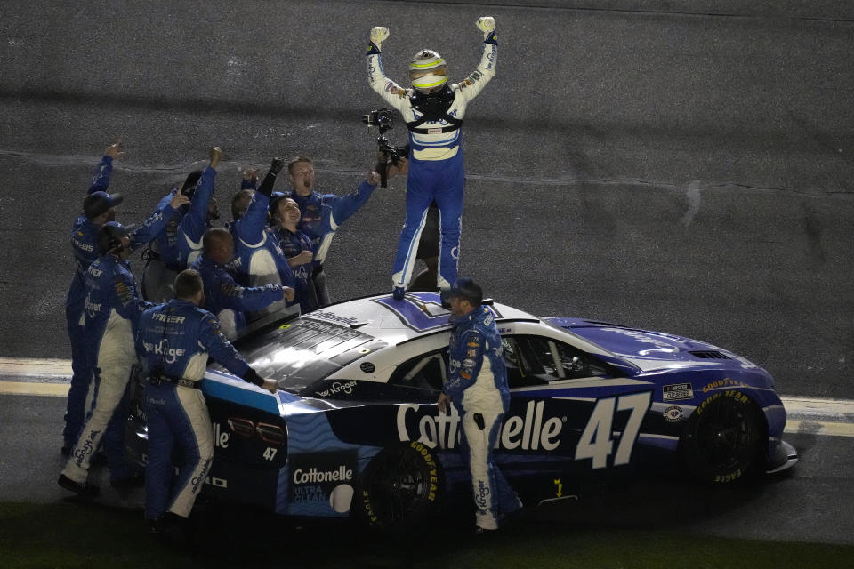 Ricky Stenhouse Jr. celebrates winning the NASCAR Daytona 500 auto race Sunday, Feb. 19, 2023, at Daytona International Speedway in Daytona Beach, Fla. (AP Photo/Chris O'Meara)