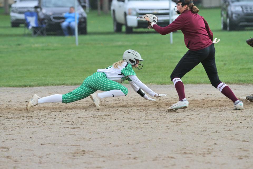 Jadyn Samson slides safely back into second base on Wednesday after getting into a pickle.