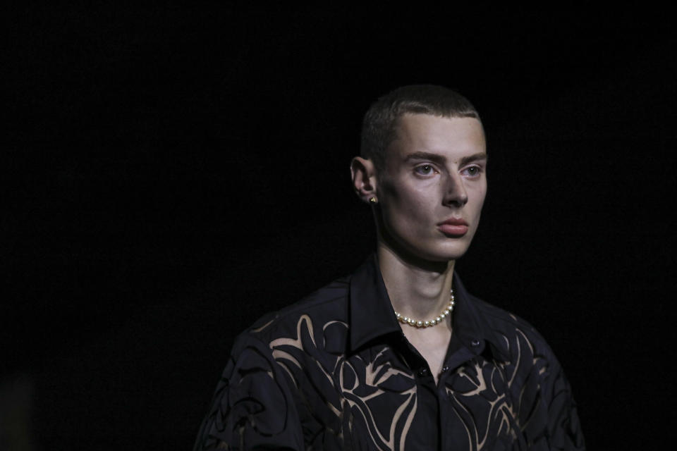 A model wears a creation for the Valentino Spring-Summer 2022 ready-to-wear fashion show presented in Paris, Friday, Oct. 1, 2021. (Photo by Vianney Le Caer/Invision/AP)