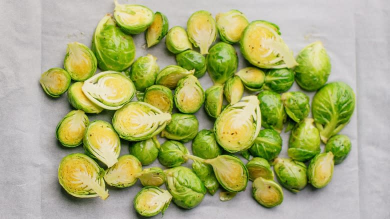 Halved Brussels sprouts on white