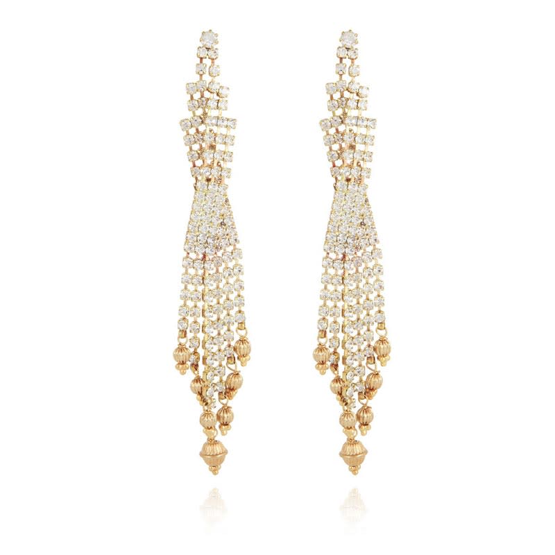 <p>En métal doré à l’or fin, strass et pampilles, Gas Bijoux, <a href="https://www.gasbijoux.com/sofia-strass-earrings-gold.html#140=13&92=59" rel="nofollow noopener" target="_blank" data-ylk="slk:www.gasbijoux.com;elm:context_link;itc:0;sec:content-canvas" class="link ">www.gasbijoux.com</a>, 160 €</p>