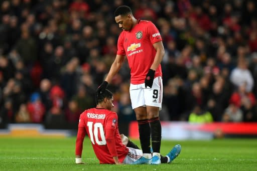 Painful cameo: Marcus Rashford was forced off after just 15 minutes as a second half substitute