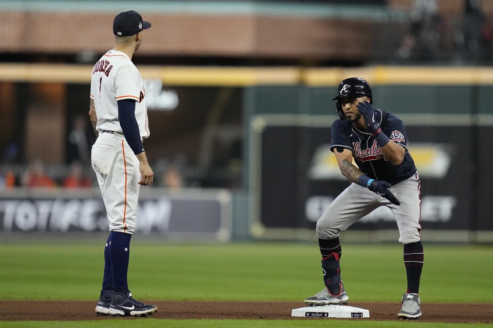 Atlanta Braves' Drew Smyly celebrates after a double during the sixth inning of Game 1 in baseball's World Series between the Houston Astros and the Atlanta Braves Tuesday, Oct. 26, 2021, in Houston. (AP Photo/Ashley Landis)