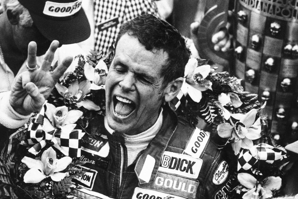 FILE - In this May 24, 1981, file photo, Bobby Unser holds three fingers aloft after winning his third Indianapolis 500 auto race ,in Indianapolis, Ind. 
