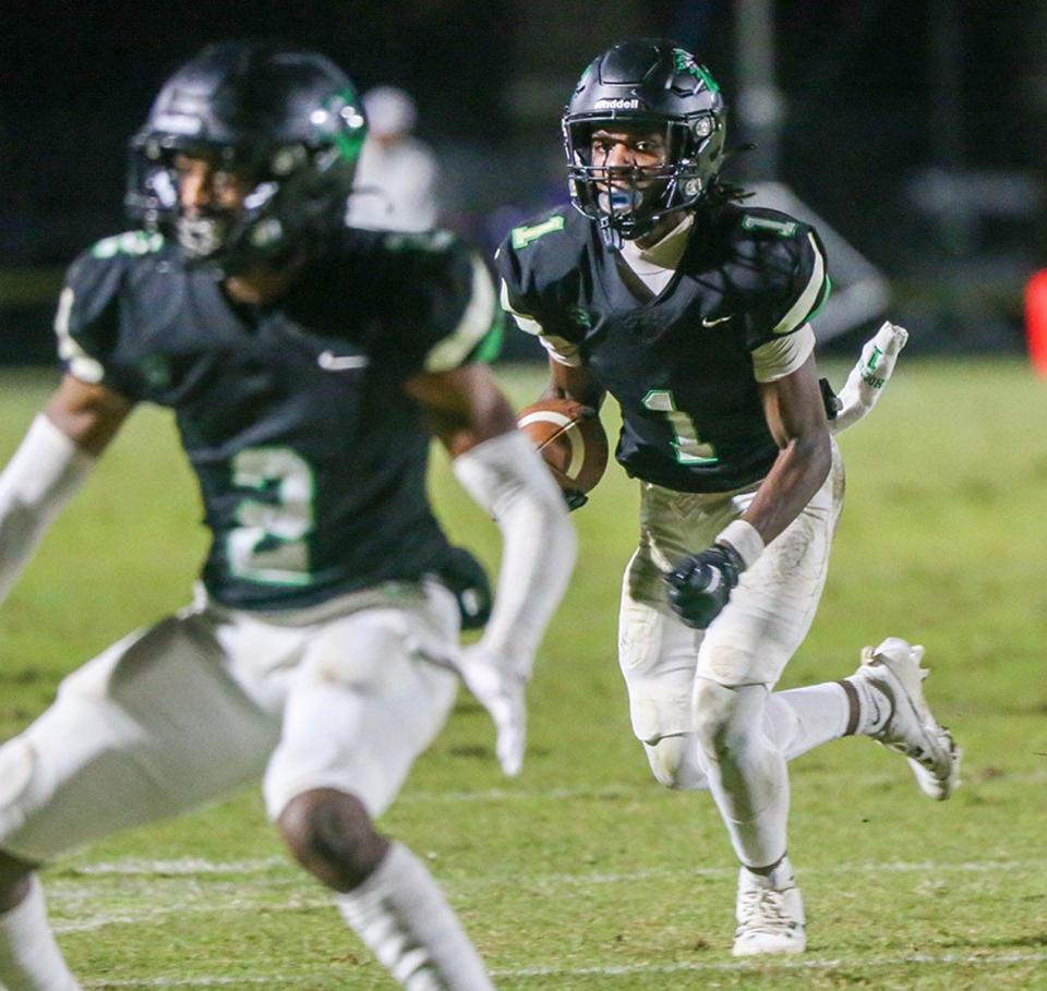 Isaiah Johnson follows his blockers during the Choctaw Columbia regional quarterfinal playoff football game at Choctaw.