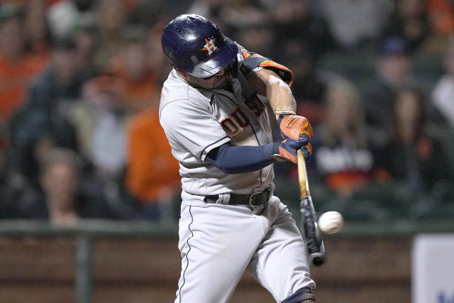 Houston Astros' Jose Altuve hits a grand slam against the San Francisco Giants during the sixth inning of a baseball game Friday, July 30, 2021, in San Francisco. (AP Photo/Tony Avelar)
