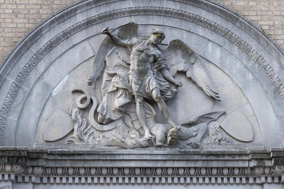 A relief of the St. Michael the Archangel, the church's patron saint, is among the architectural grace notes cited by the National Register of Historic Places.