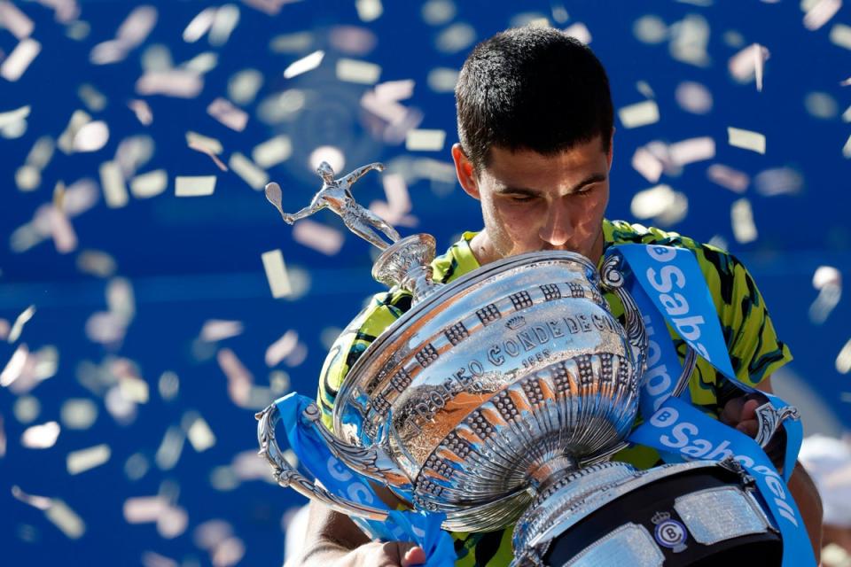 Carlos Alcaraz kisses the Barcelona Open trophy (Joan Monfort/AP) (AP)