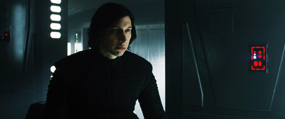Adam Driver staring blankly into the distance