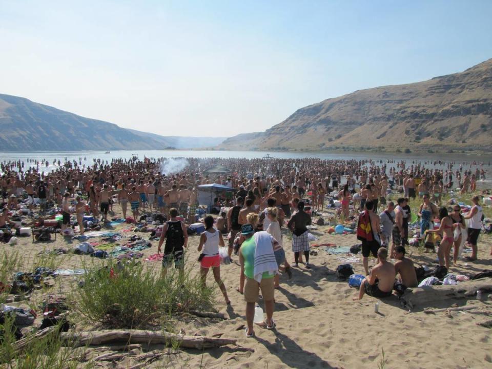 Illia Dunes on the Snake River was packed with people on an August weekend. The party, in 2012, left the area covered with trash, broken bottles and beer cans.