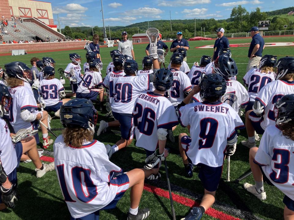 Chenango Forks coaches address the boys following a state semifinal win, June 8, 2022.