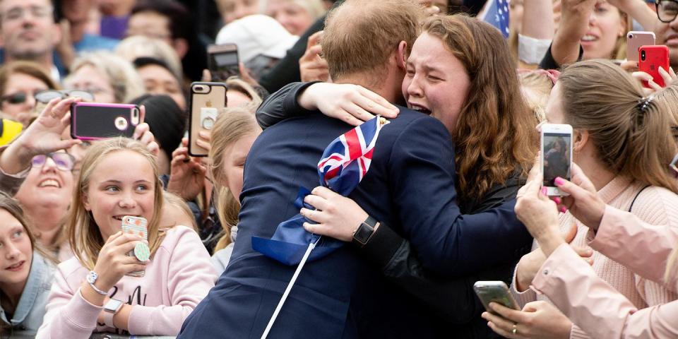 <p>Prince Harry meets his <a rel="nofollow noopener" href="https://www.harpersbazaar.com/celebrity/latest/a23882821/prince-harry-royal-tour-meets-crying-fan-meghan-markle/" target="_blank" data-ylk="slk:Number One Fan;elm:context_link;itc:0;sec:content-canvas" class="link ">Number One Fan</a>.</p>