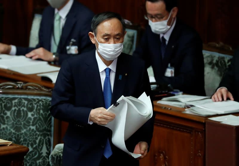 Japan's Prime Minister Yoshihide Suga delivers his policy speech at the opening of the Lower House parliamentary session in Tokyo