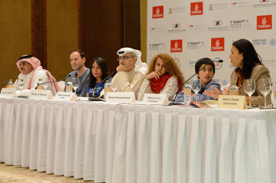 DUBAI, UNITED ARAB EMIRATES - DECEMBER 12: Fahad al Sukait, Gerhard Meixner, director Haifaa Al Mansour, Artistic Director of DIFF Masoud Amralla Al Ali, and actors Waad Mohammed and Abdulrahman al Guhani attend the "Wadjda" press conference during day four of the 9th Annual Dubai International Film Festival held at the Madinat Jumeriah Complex on December 12, 2012 in Dubai, United Arab Emirates. (Photo by Andrew H. Walker/Getty Images for DIFF)