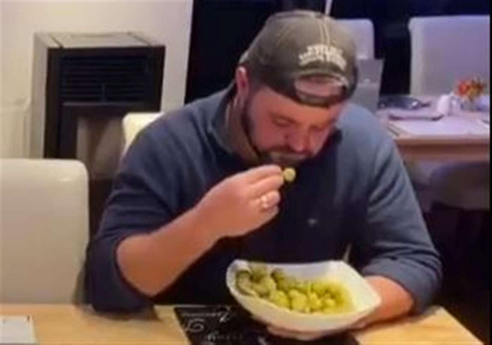 Wayne Sherlock on his way to breaking the world record for eating sprouts. [Photo: SWNS]