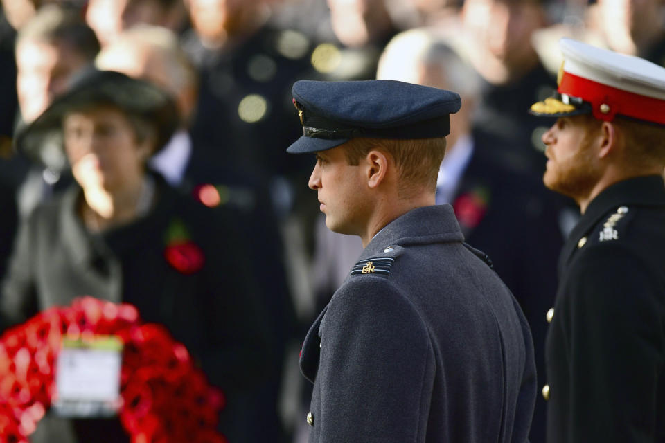 Britain's Prince William and Prince Harry, right, during the remembrance service at the Cenotaph memorial in Whitehall, central London, Sunday Nov. 11, 2018. The ceremony marks the 100th anniversary of the signing of the Armistice which ended the First World War. (Victoria Jones/Pool via AP)